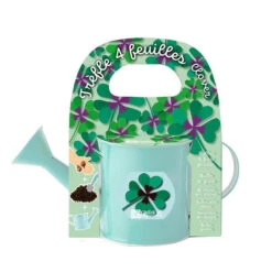 Petit Arrosoir Bleu Avec Graines De Trèfles à Semer